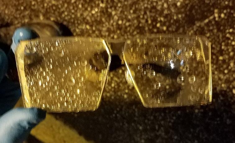 Front view of possible suspect glasses with hexagonal lenses. 